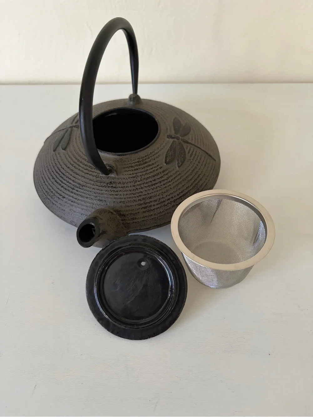Black Cast Iron Dragonfly Motif Teapot with Curved Handle
